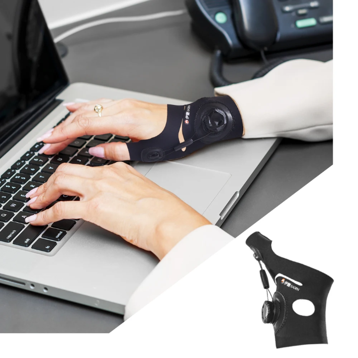 Reference black wrist brace worn while typing